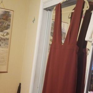 Red dress sips in back....